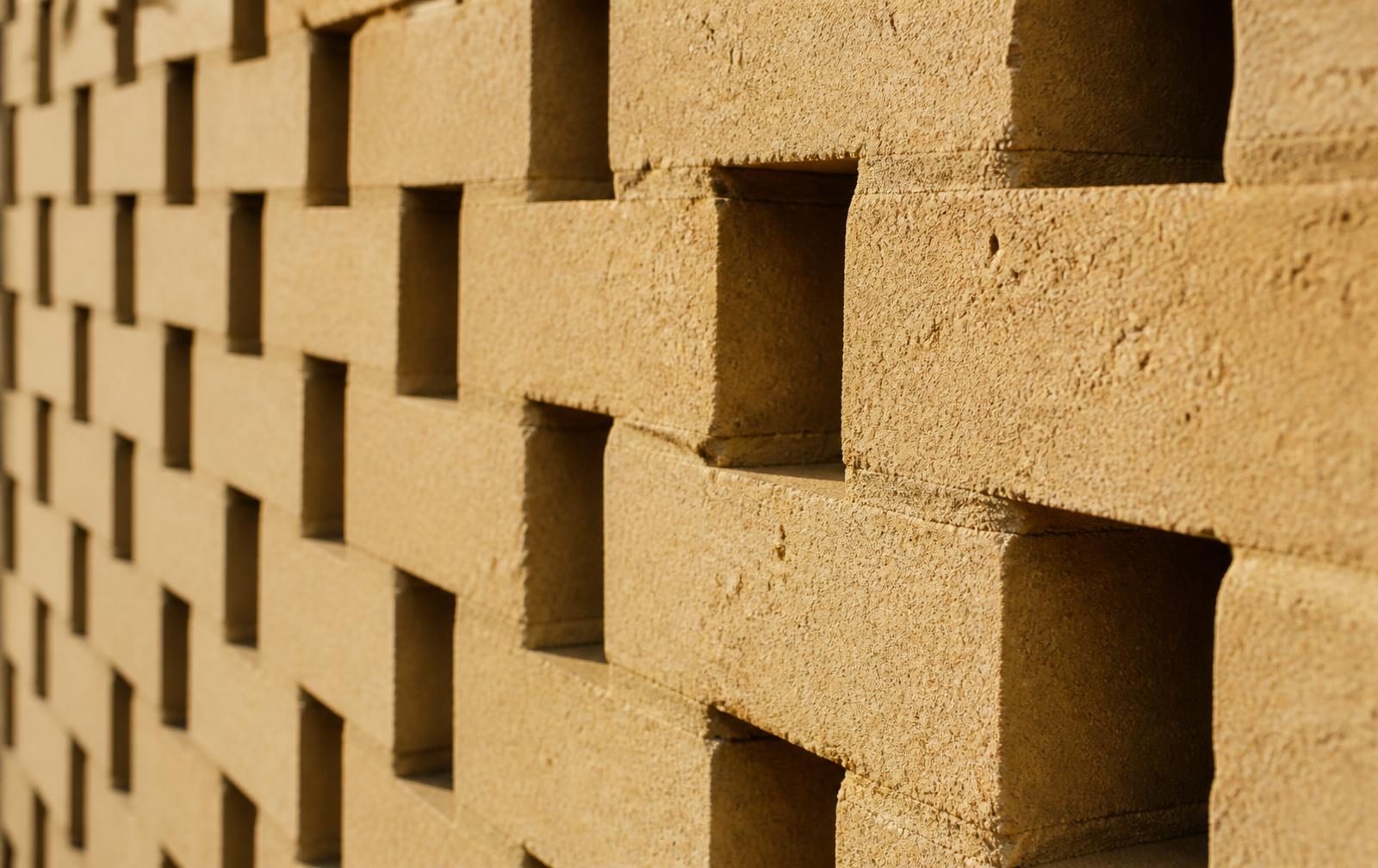 Parede de tijolos ecológicos EcoMarca aparentes